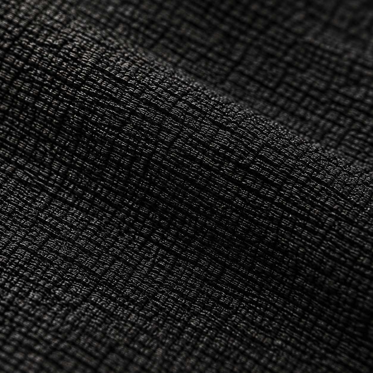 Close-up of the flat kessa weave the glove is made from