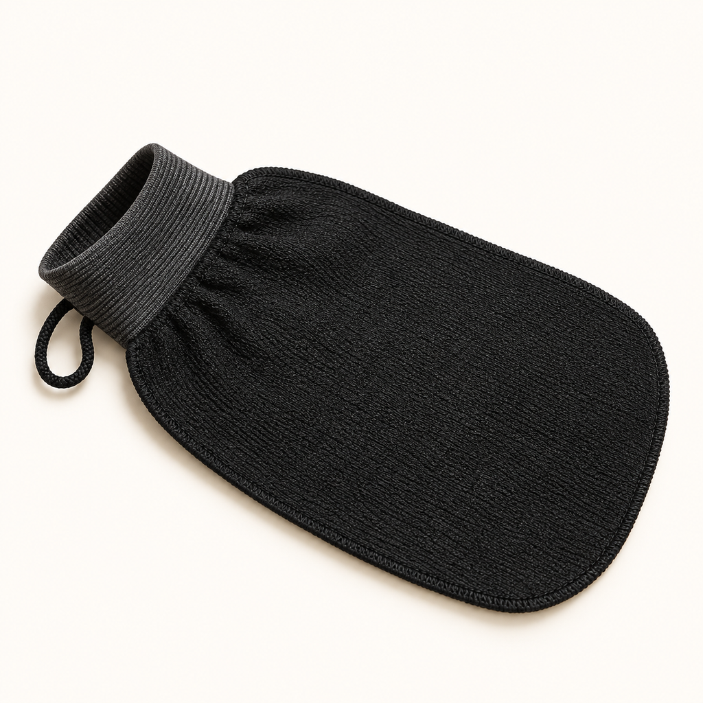 The grey ribbed cuff and the cord loop for hanging the glove to dry