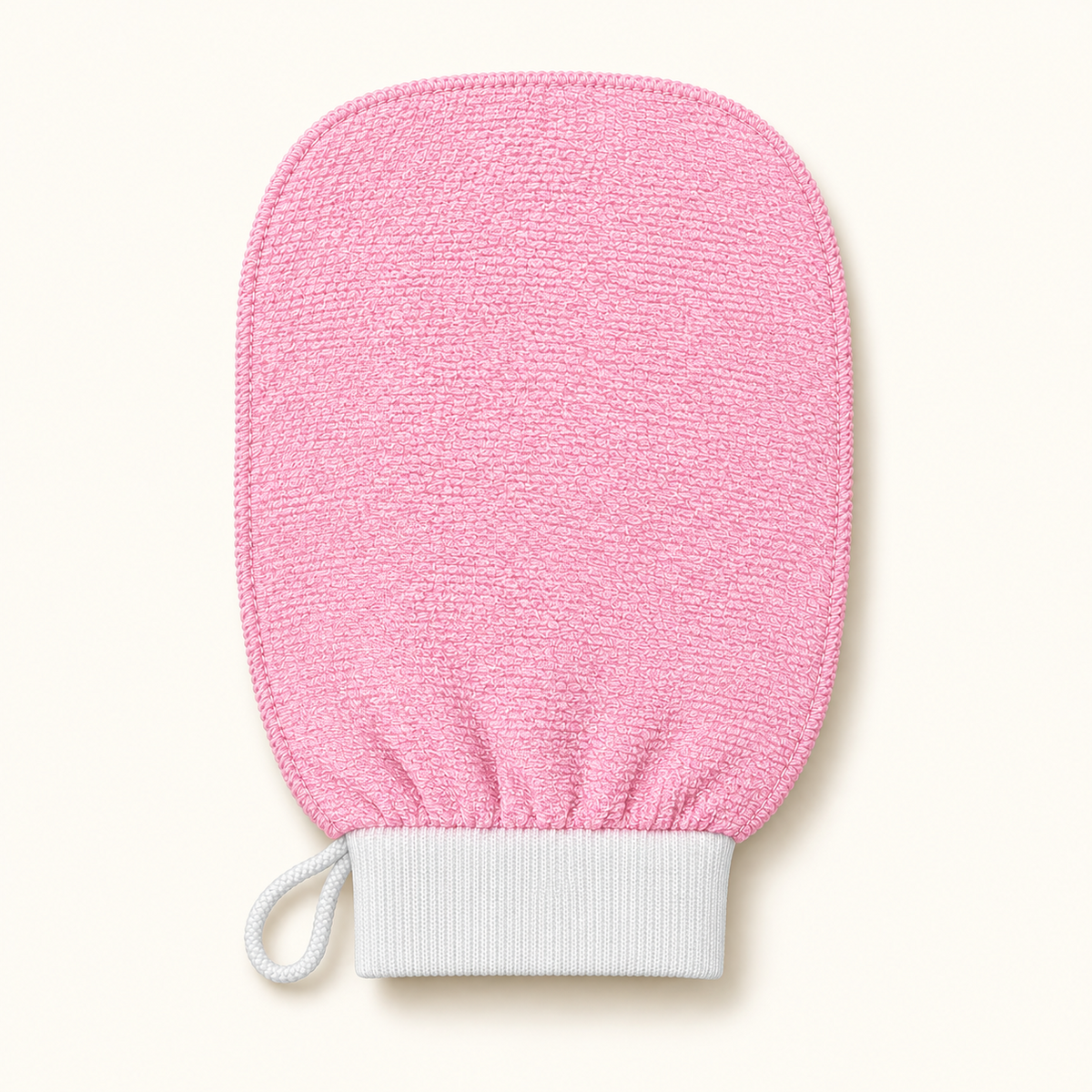 The Sunday Scrub exfoliating glove in pink, front view on a cream background